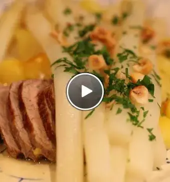 Witte asperges met sinaasappeldressing en kalfsoester