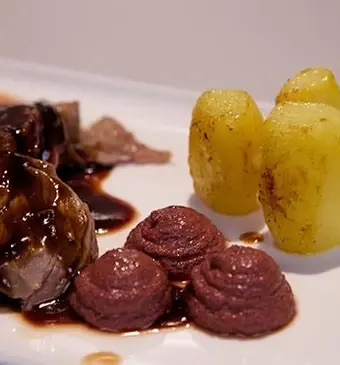 Entrecote met pommes fondant en portjus