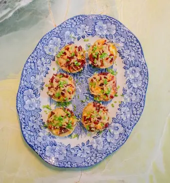 Gevulde smashed potatoes van Bibi's Bijgerechten.