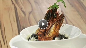 Inktvisrisotto met gamba's en witte wijnsaus