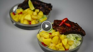 Zoete en pittige varkensribbetjes met fruitsalsa