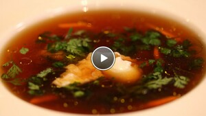 Kalfsbouillon met kervel en truffelolie