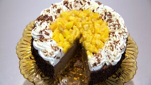 Chocolade cheesecake met gebakken mango