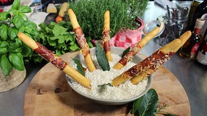 Grissini met Parmaham en Parmezaan