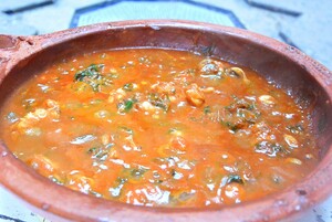Tajine van zeeduivel en inktvis