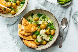 Curry met zeewolf, krieltjes en doperwten