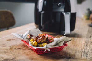 Pittige kip met tomatensalsa en kerriekrieltjes