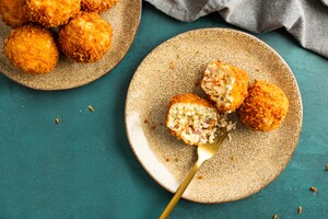 Arancini met parmaham en pecorino