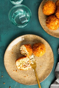 Arancini met parmaham en pecorino