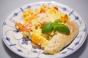 Oranje risotto met kalkoen