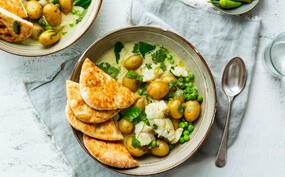 Curry met zeewolf, krieltjes en doperwten