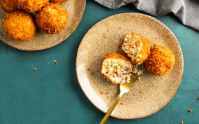 Arancini met parmaham en pecorino
