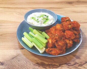 Buffalo wings en blue cheese dip
