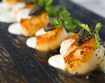 Drie bereidingen van coquilles Saint-Jacques