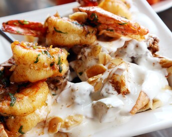 Pittige Indiase gamba's met raita