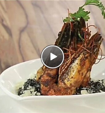 Inktvisrisotto met gamba's en witte wijnsaus