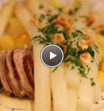 Witte asperges met sinaasappeldressing en kalfsoester