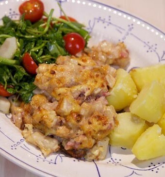 Romige knolselderij met komijnekaas uit de oven