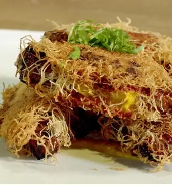 Lamsfilet in kadayıf deeg met wortel-basilicumpuree