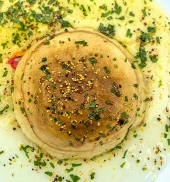 Gevulde portobello’s met risotto, cantharellen en dragon