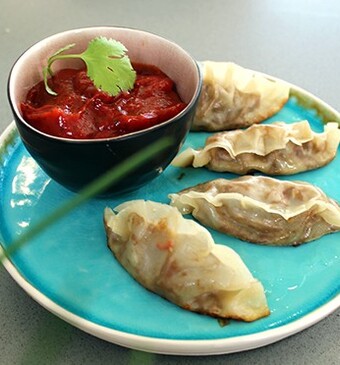 Gyoza dumplings van gekonfijte eend