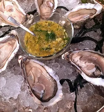 Oesters met passievolle vinaigrette