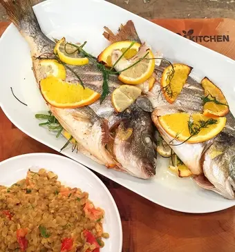 Hele dorade uit de oven met linzen
