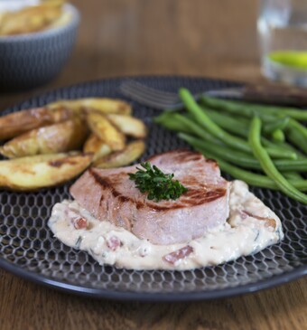 Varkensoester met sperzieboontjes en geroosterde aardappeltjes