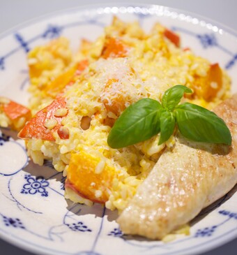 Oranje risotto met kalkoen