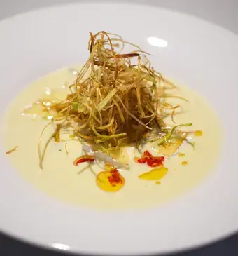 preisoep met camembert en chili-olie