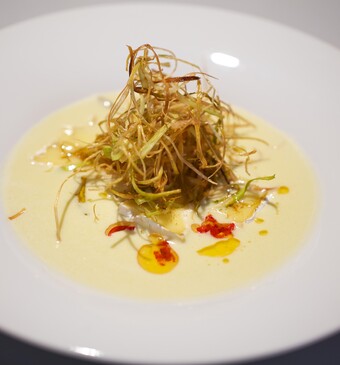 preisoep met camembert en chili-olie