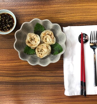 Gyoza met tofu, kimchi (gefermenteerde groente) en shiitake