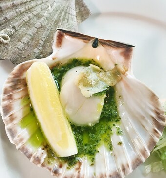 Coquilles met kruidenboter