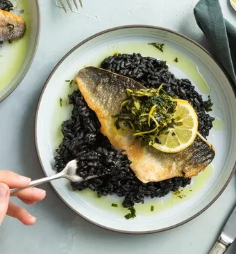 Risotto met zeebaars en gremolata