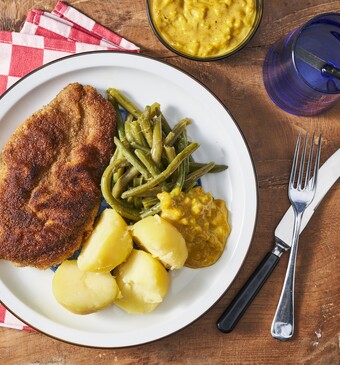 Gepaneerde kip met kerrie-ananas-saus