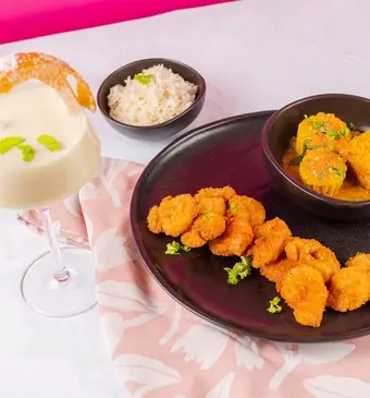 Coconut Shrimps en Cajun Coconut Butter Corn 