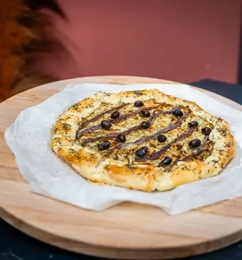 galette met ui en ansjovis