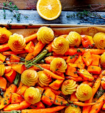 Traybake met duchesses, pompoen en sinaasappel-tijmmarinade