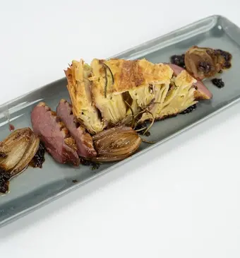 Eend met balsamicosaus van de BBQ