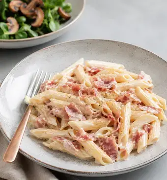 Pasta in roomsaus met ham