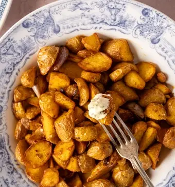 Krieltjes uit de oven met kerriesaus