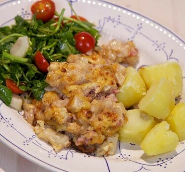 Romige knolselderij met komijnekaas uit de oven