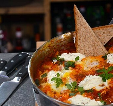 Shakshuka met extra eitjes