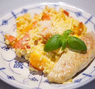 Oranje risotto met kalkoen