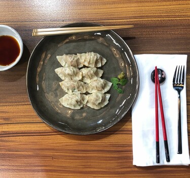 Gyoza met shiitake, gehakt, prei, gember en spitskool