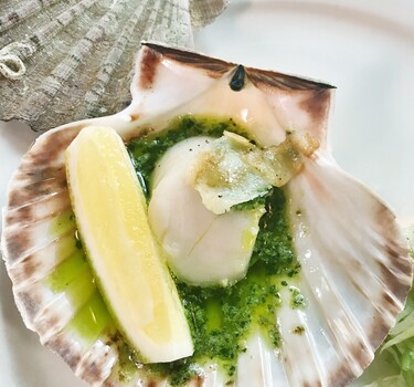 Coquilles met kruidenboter