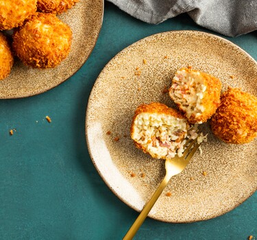 Arancini met parmaham en pecorino