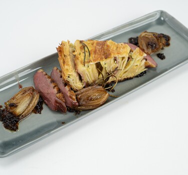 Eend met balsamicosaus van de BBQ