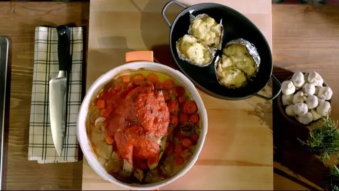 Halve kip uit de oven met gepofte aardappels