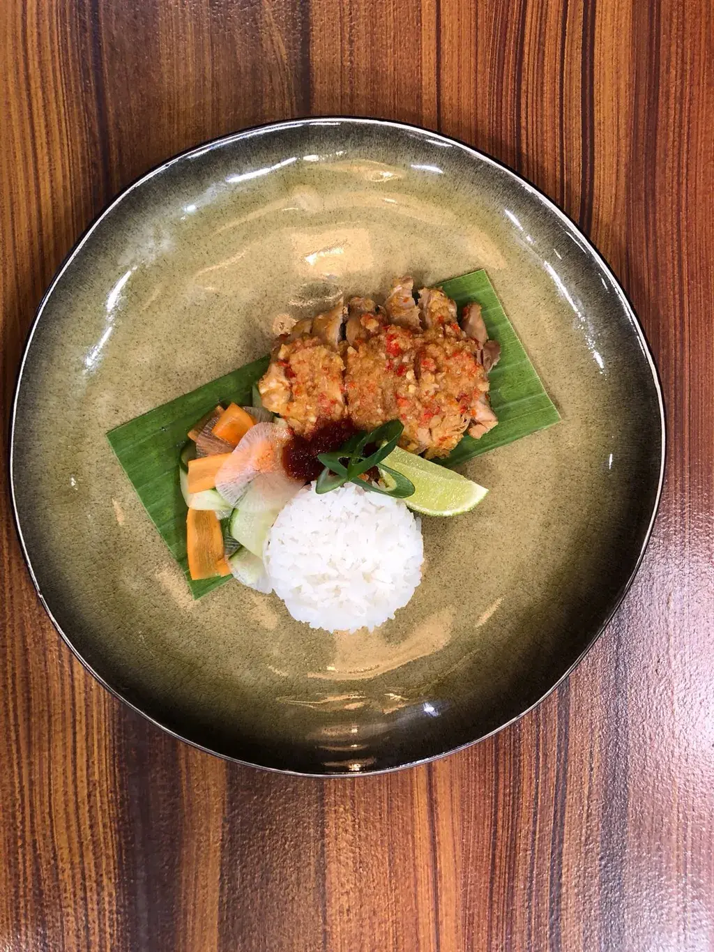 Ayam rica rica met kokos, atjar en rijst